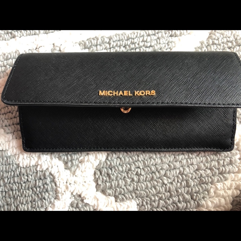 Michael kors black wallet.  SOLD